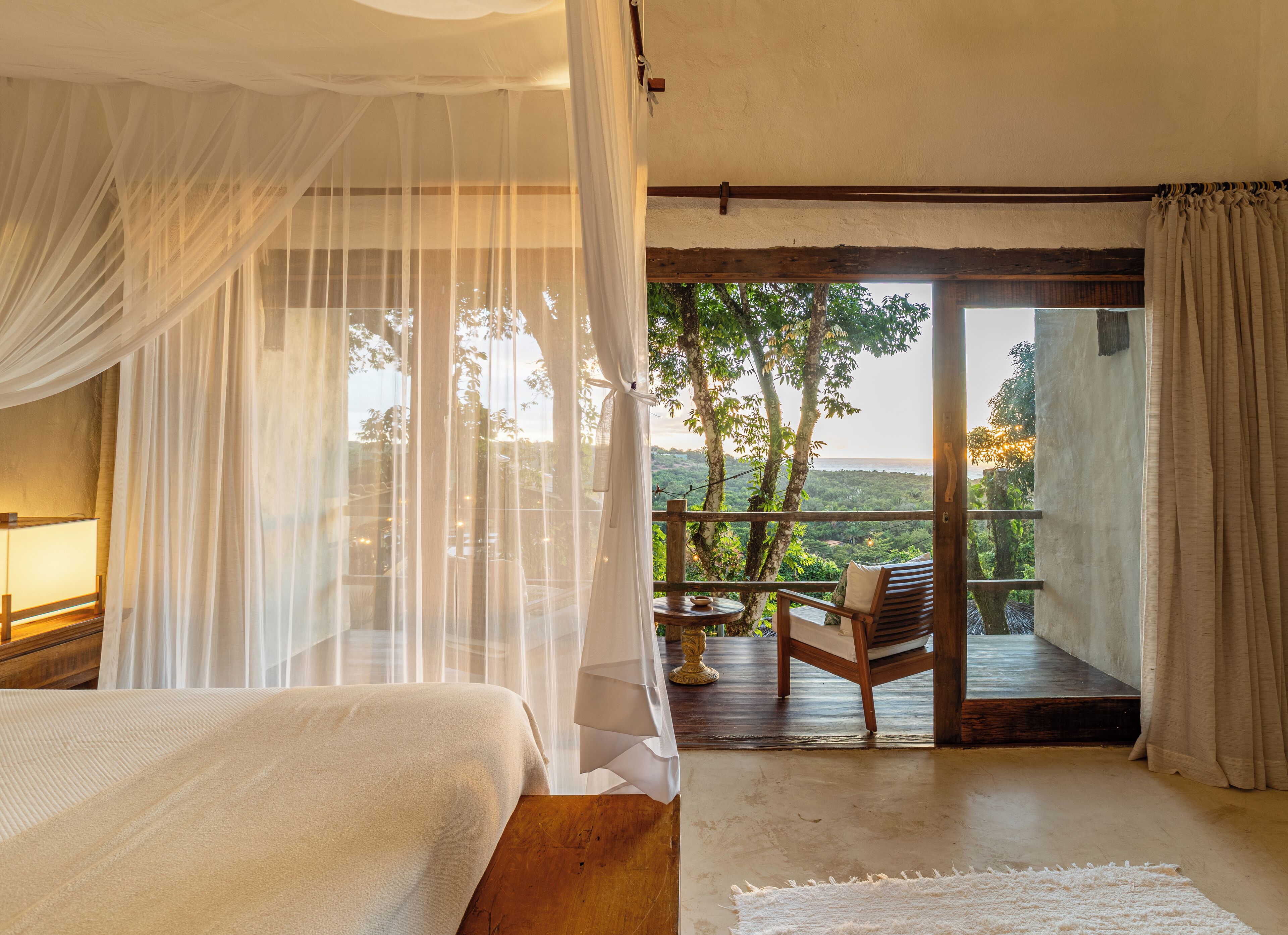 deluxe duplex, bathtub, poolside | balcony view