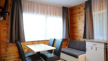 Cabane Confort, 2 chambres, cuisine | Literie hypoallergénique, fer et planche à repasser, Wi-Fi gratuit