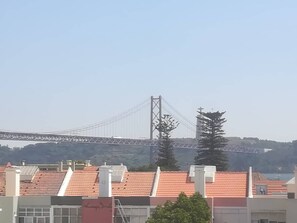 A view of a bridge with a clear sky. - The Bridge (Lisbon)