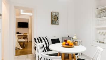 Superior Suite | Living area | Smart TV, tablet, iPod dock