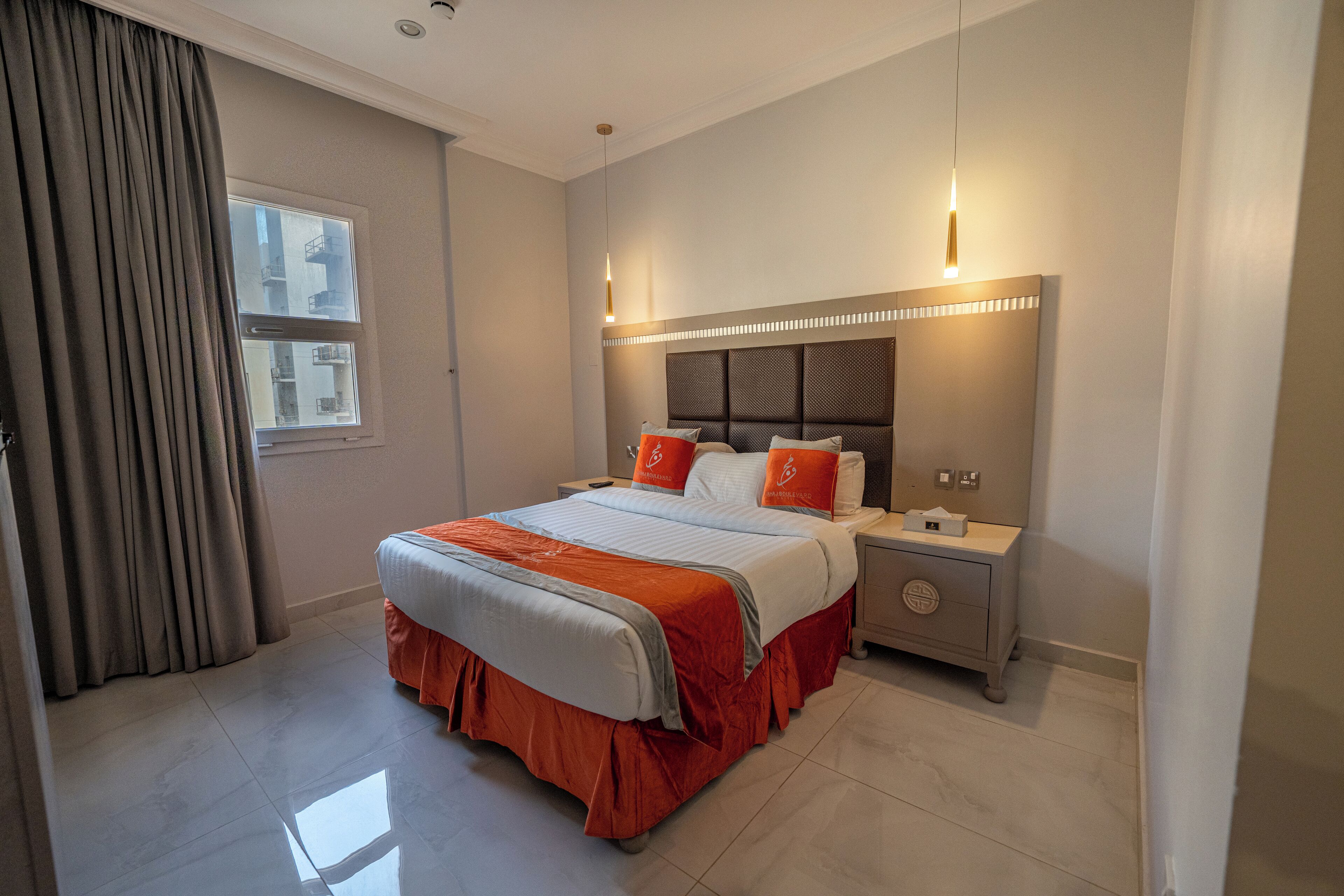 Apartemen Deluks, 2 kamar tidur | 1 kamar tidur, seprai premium, minibar, dan brankas