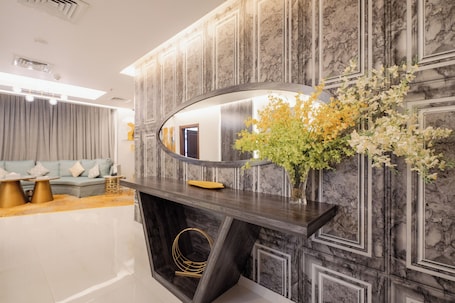 Royal Suite, 2 Bedrooms | Living area | 43-inch flat-screen TV with cable channels, TV