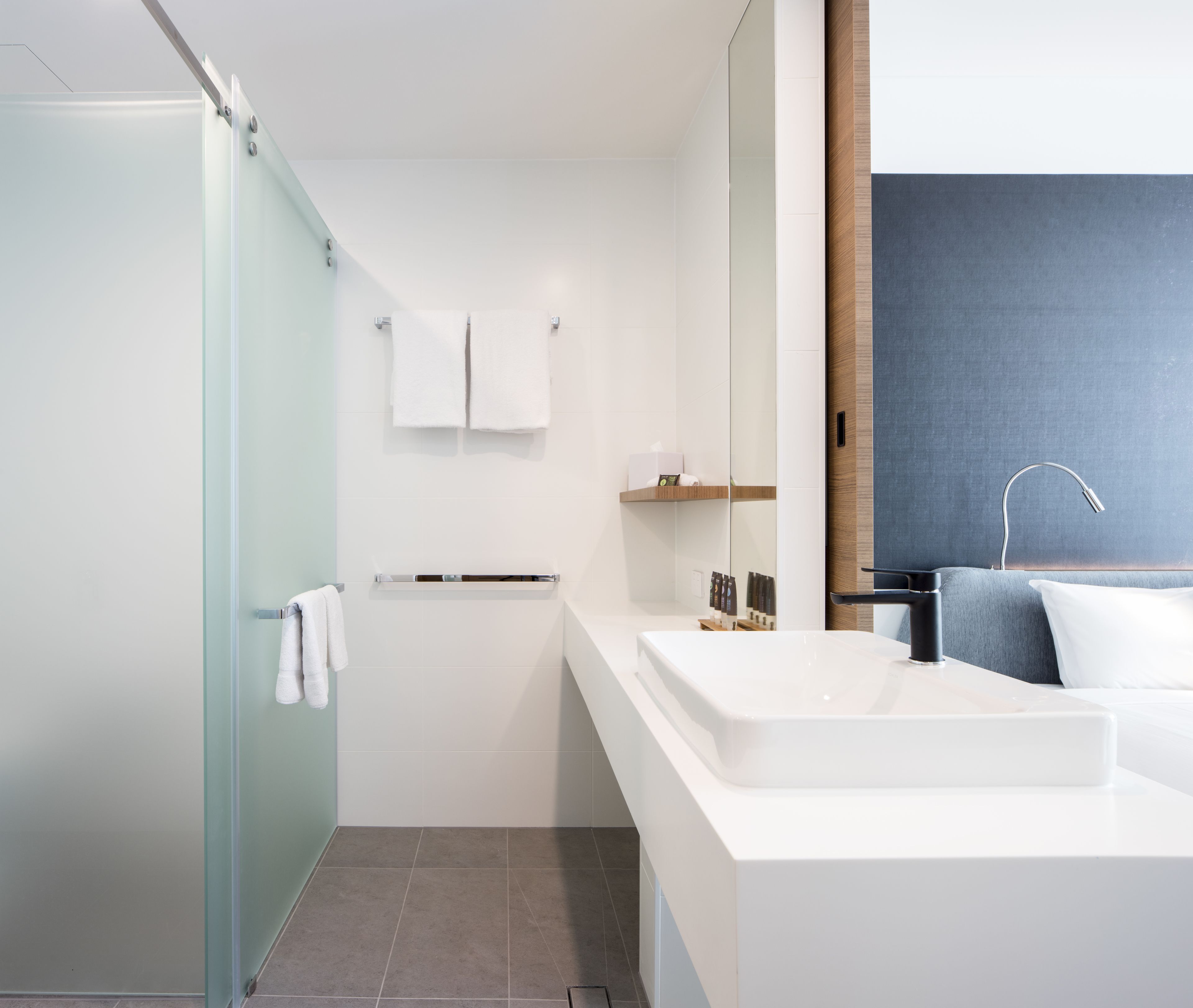 shower, eco-friendly toiletries, hair dryer, towels