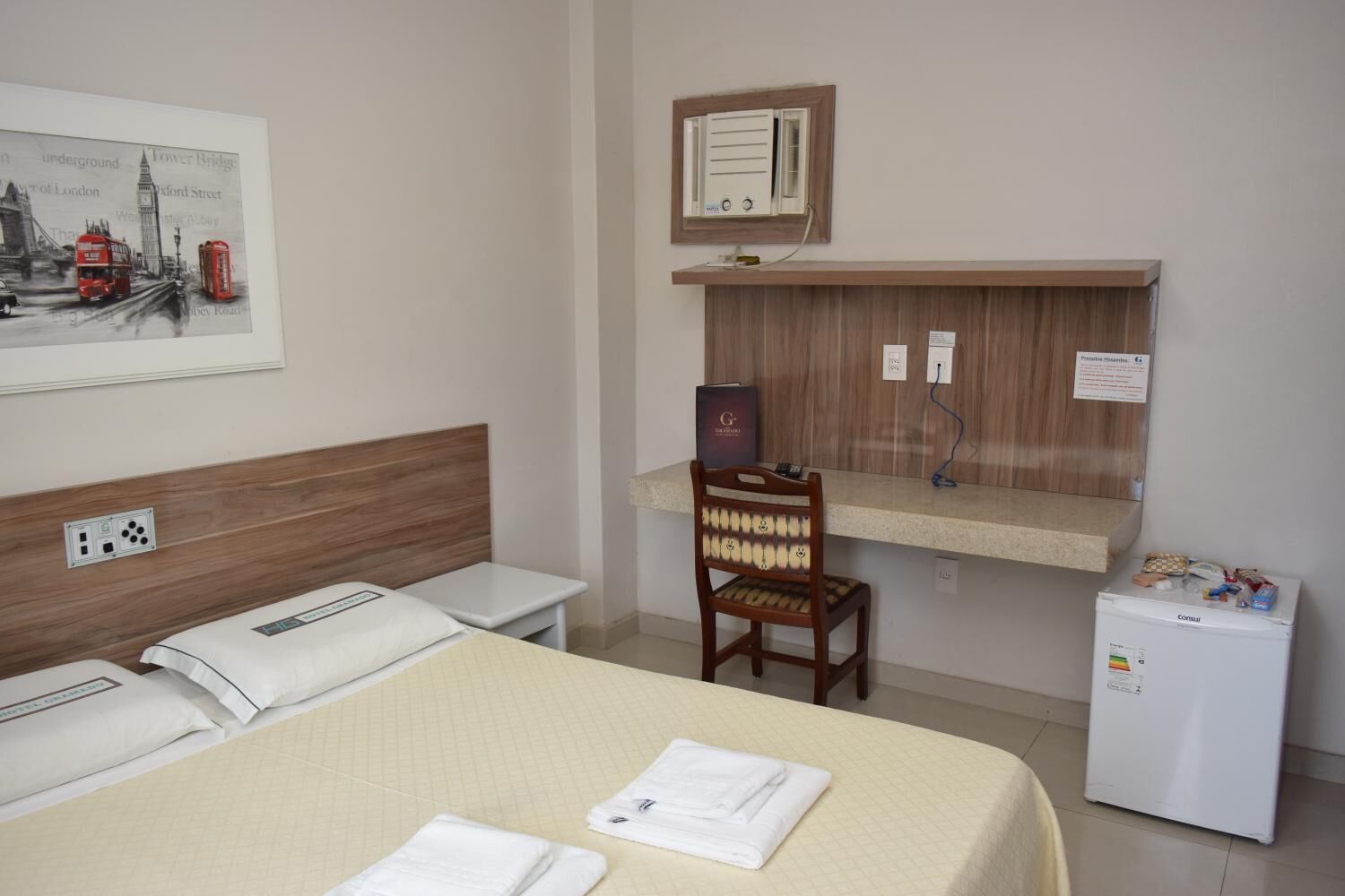 minibar, desk, blackout curtains, iron/ironing board