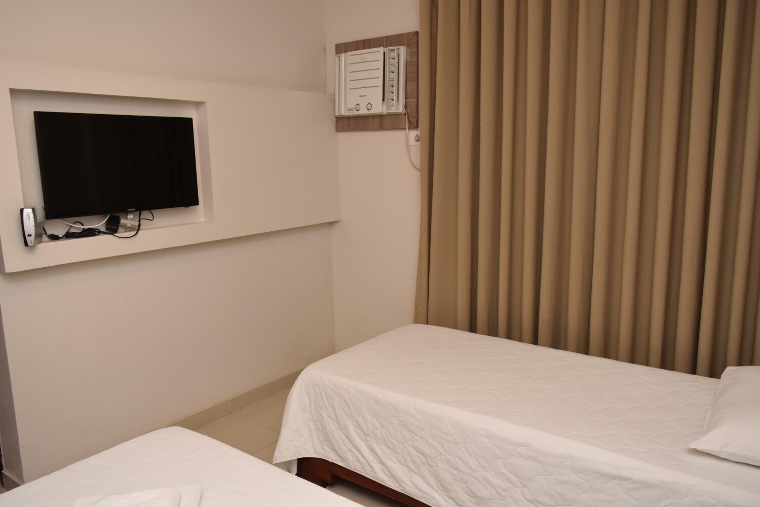 minibar, desk, blackout curtains, iron/ironing board