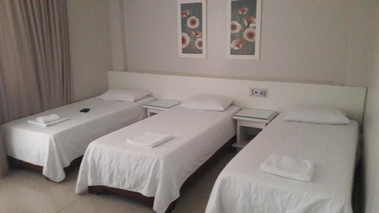 minibar, desk, blackout curtains, iron/ironing board