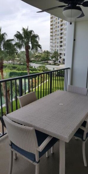 Outdoor dining - See Beautiful Sunsets Over The Gulf From Your Private Balcony  (Clearwater)