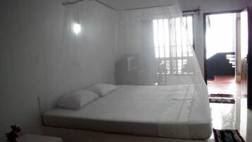 Deluxe Double Room, Smoking, Beach View | 3 bedrooms, premium bedding, in-room safe, desk