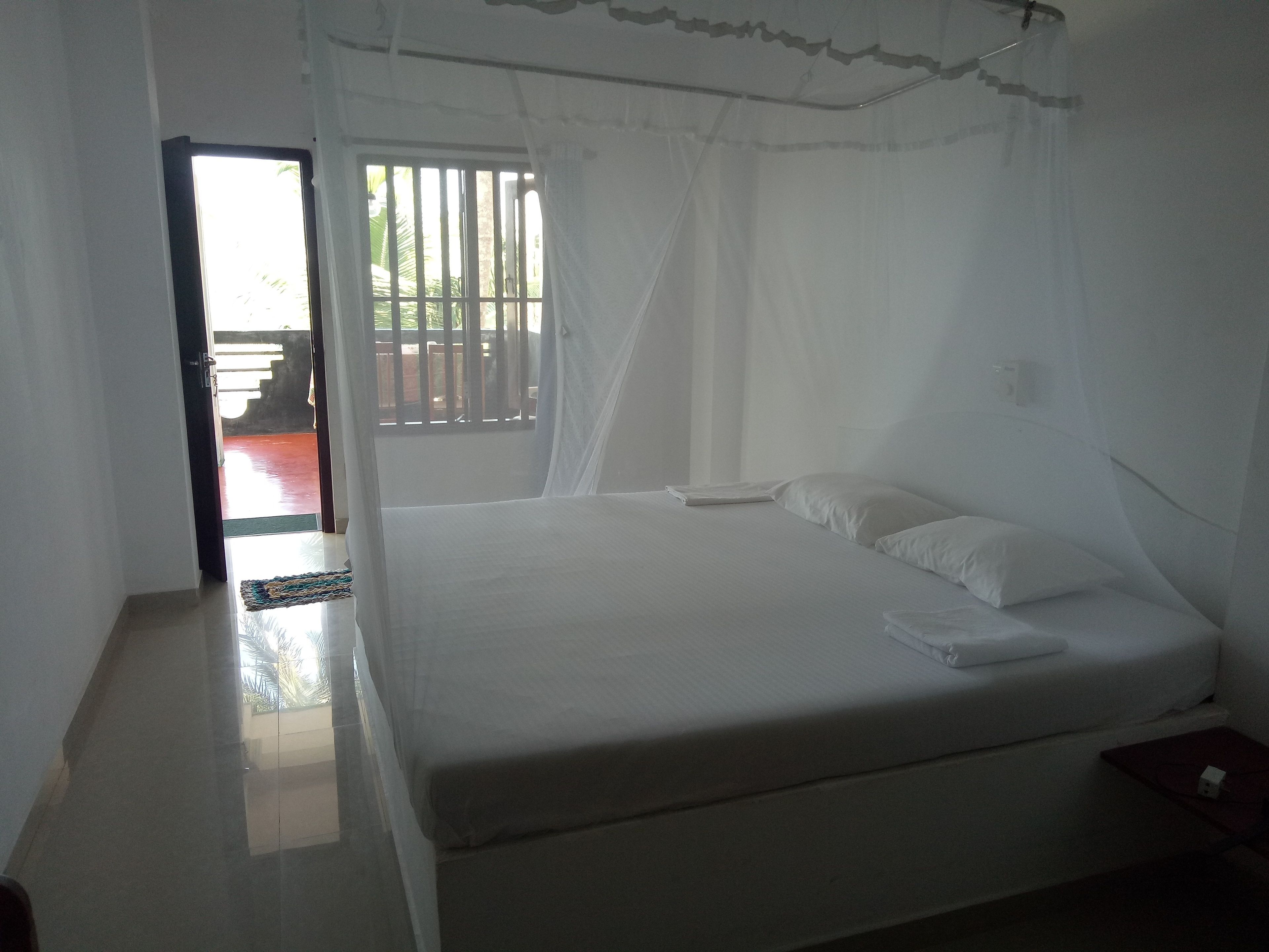 デラックス ダブルルーム 喫煙可 ビーチビュー | 客室の設備とサービス