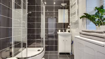 Shower, free toiletries, hair dryer, towels