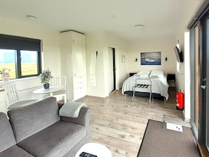 Panoramic Cabin, 1 Queen Bed, Kitchenette, Lake View | Living area | Flat-screen TV