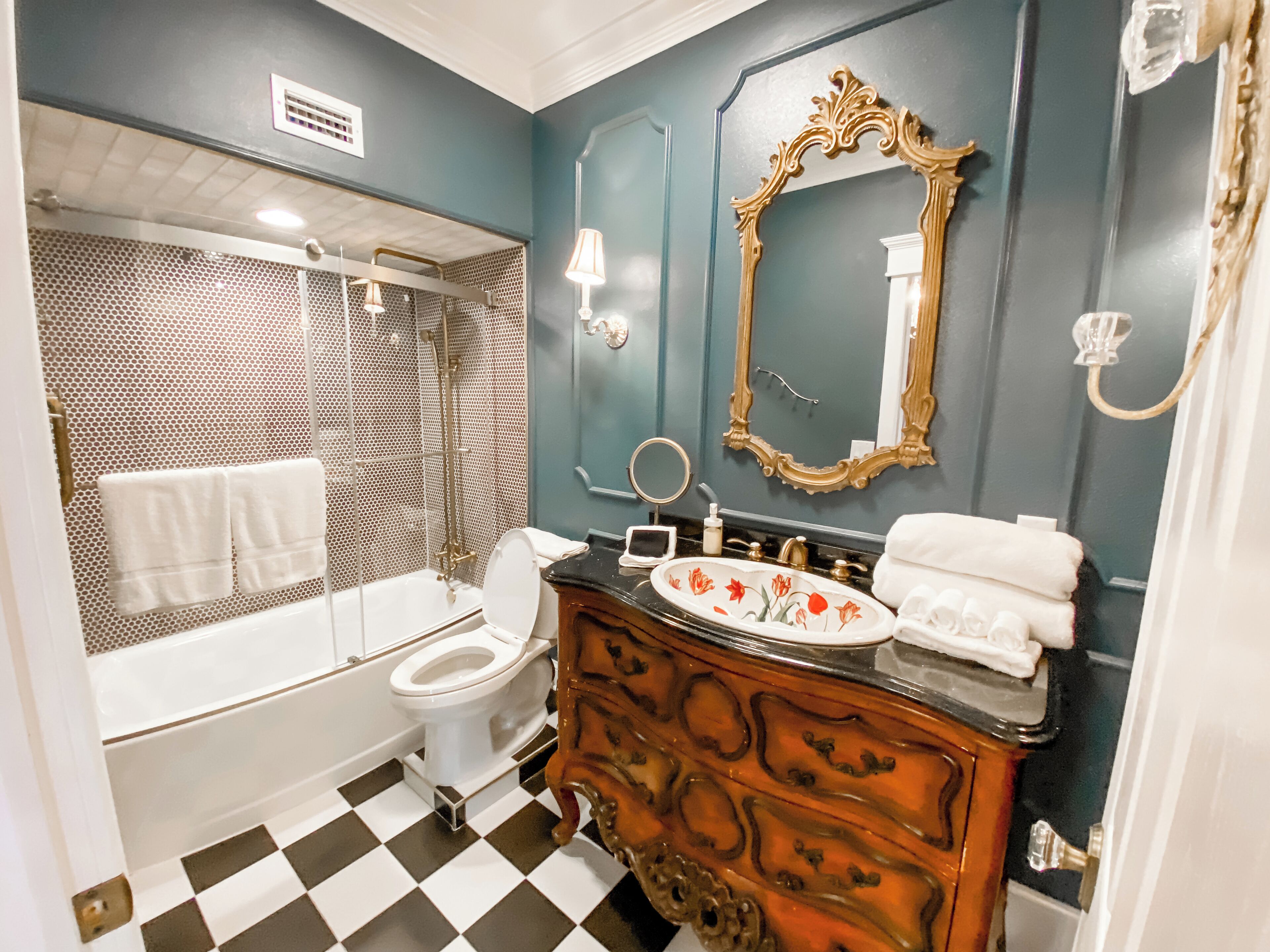the rose tearoom suite | bathroom | shower, hair dryer, towels, soap