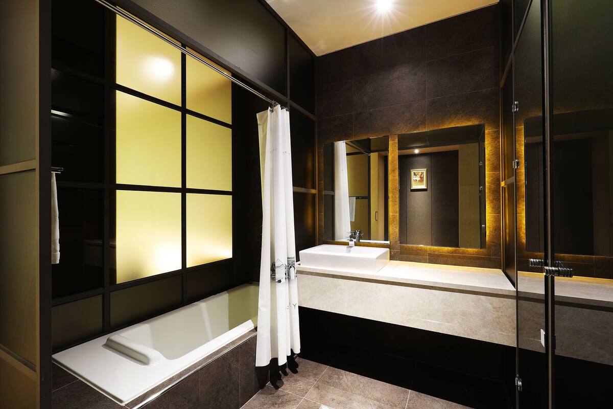 superior twin room - certified korea tourism quality break (breakfast is not available on mondays) | bathroom | free toiletries, hair dryer, bathrobes, slippers