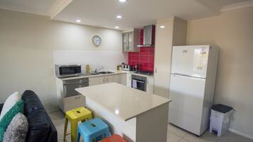 Apartment, 2 Bedrooms | Private kitchen | Full-sized fridge, microwave, oven, stovetop