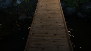 A wooden dock leading to a house with string lights and a peace sign on the door. - Waterfront Lakefront Cottage, Sleeps 6. Parking.  (Old Town)