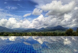 Outdoor pool, open 7 AM to 9 PM, pool loungers - Pua De View Boutique Resort (Pua)