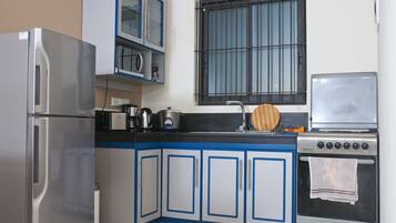 Appartement | Cuisine privée | Réfrigérateur, micro-ondes, four, plaque de cuisson