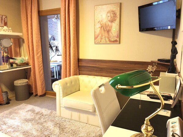 Apartment, 1 Bedroom | Living area | Flat-screen TV, fireplace - Gästehaus Monika (Hornbach)