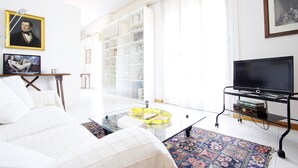 Apartamento, 2 quartos | Área de estar