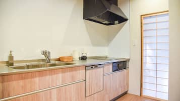 Private Vacation Home | Private kitchen | Fridge, microwave, electric kettle, cookware/dishes/utensils