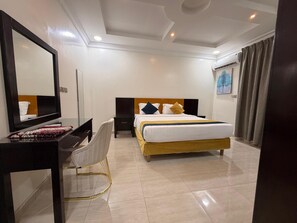 Apartment, 2 Bedrooms | Desk, soundproofing, iron/ironing board, free WiFi -  Arous Al-Faisaliah Serviced Apartments شقق عروس الفيصلية للشقق المخدومة (Dammam)