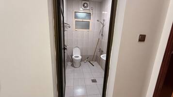 Apartment, 1 Bedroom | Bathroom | Free toiletries, hair dryer, bathrobes, slippers