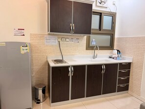 Private kitchen -  Arous Al-Faisaliah Serviced Apartments شقق عروس الفيصلية للشقق المخدومة (Dammam)