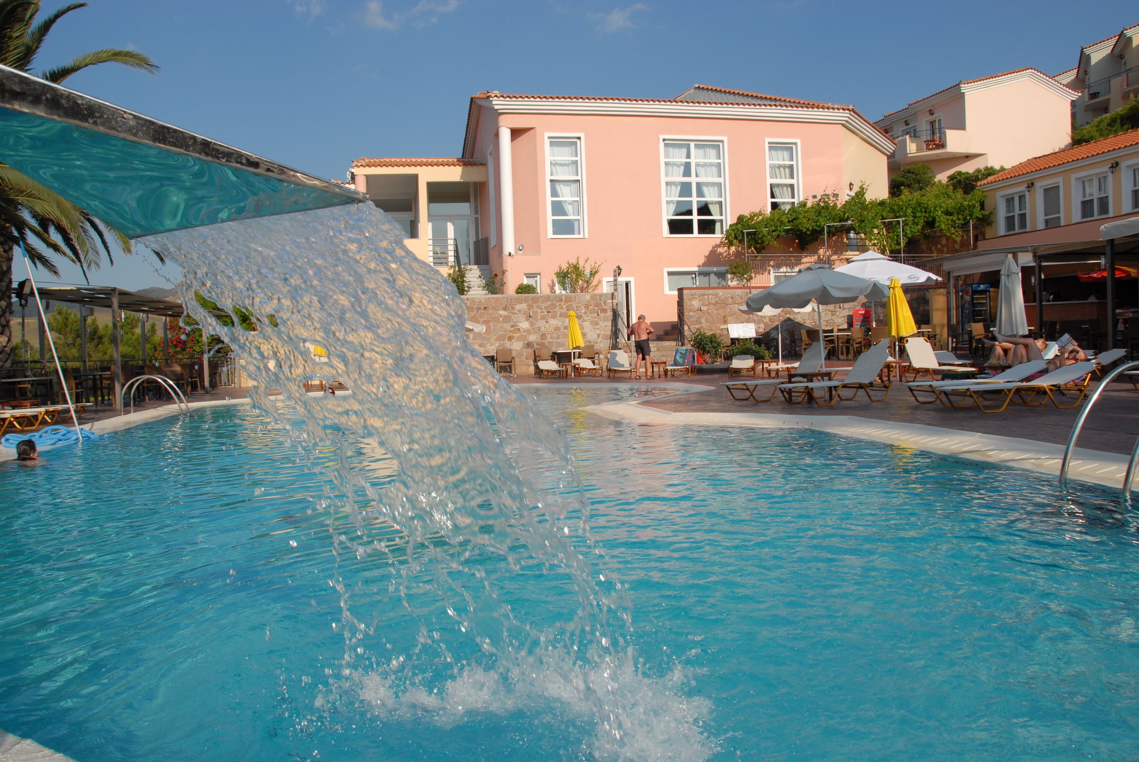 2 outdoor pools, a waterfall pool, open 8 am to 8 pm, pool umbrellas