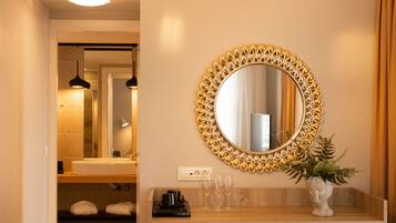 Junior Suite, 1 Bedroom, Sea View | Minibar, in-room safe, individually furnished, desk