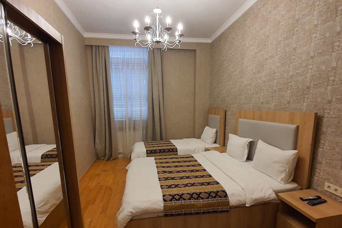 Standard Apartment, 3 Bedrooms, Balcony, City View | Premium bedding, individually furnished, soundproofing