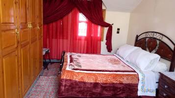 Family Apartment, 3 Bedrooms | 3 bedrooms, iron/ironing board, free WiFi