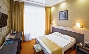 Ropa de cama de alta calidad y minibar 