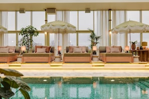 Indoor pool, outdoor pool, open 9:00 AM to 11:00 PM, pool loungers