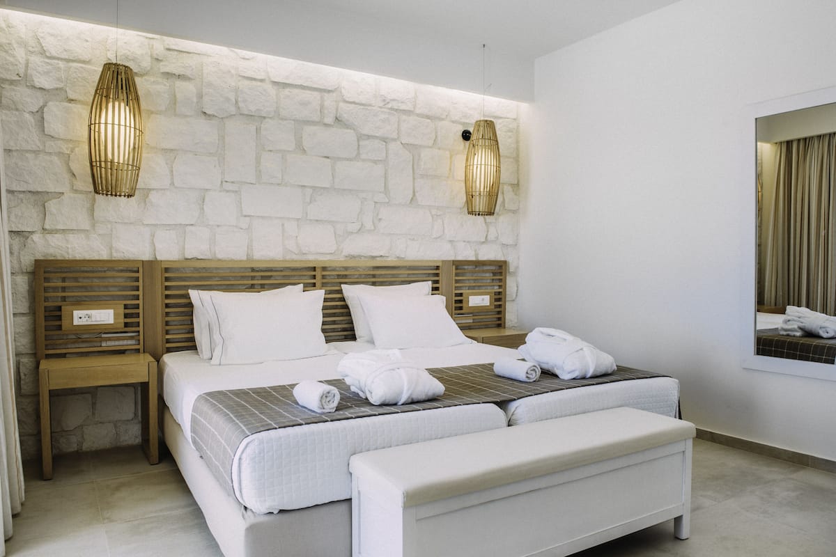 Junior Suite, 1 Bedroom, Pool View, Poolside | 1 bedroom, premium bedding, down duvets, in-room safe