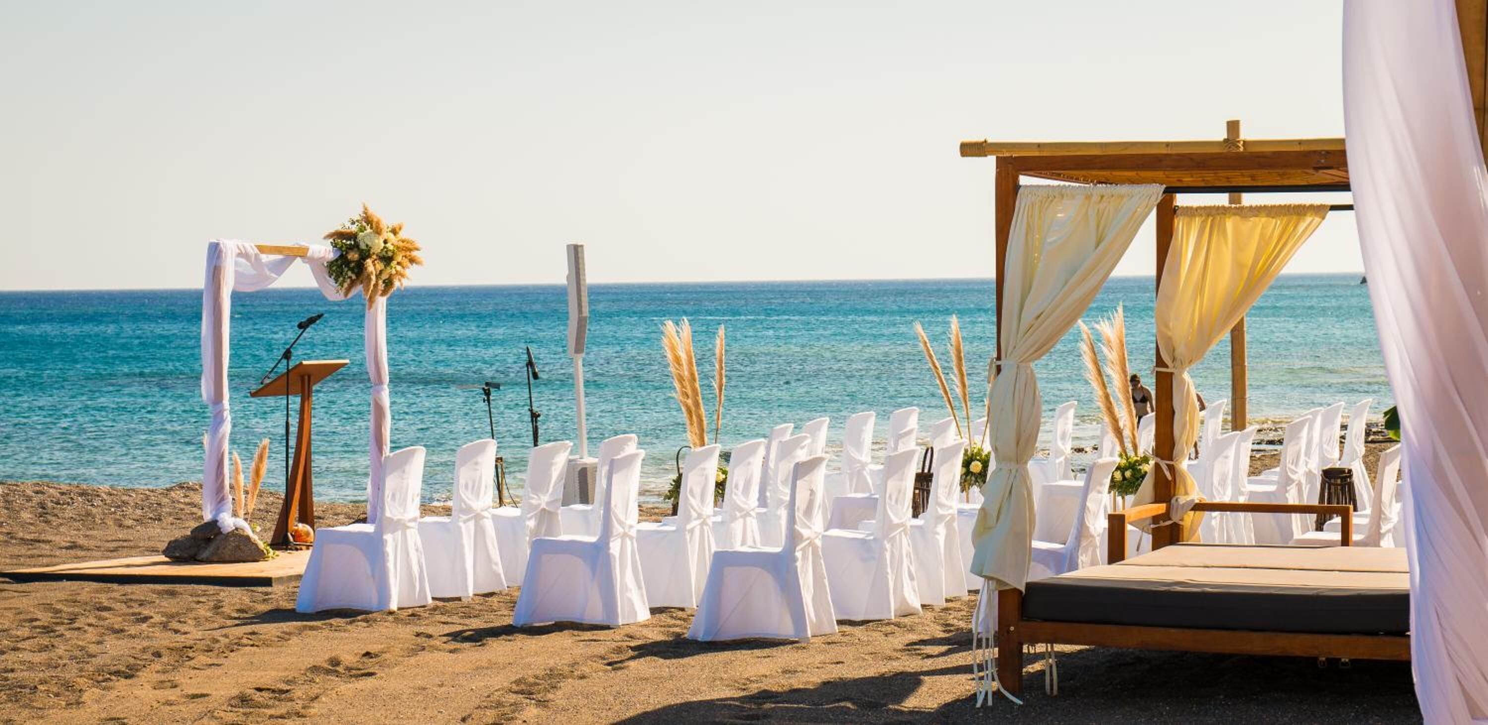 on the beach, beach cabanas, sun-loungers, beach umbrellas
