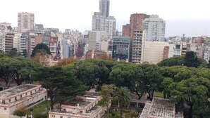 A dense urban area with a mix of modern and older buildings, including a prominent skyscraper. - Palermo Open View (Buenos Aires)