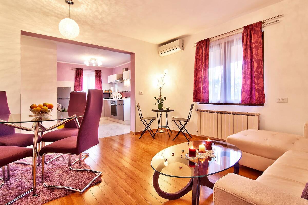 Apartment, Multiple Beds | Living room | Flat-screen TV