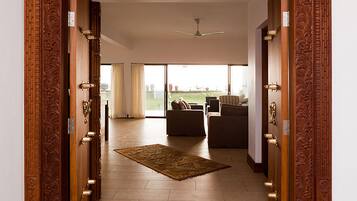 Presidential Villa, 3 Bedrooms, Kitchenette, Sea View | Living room | Flat-screen TV, pay films