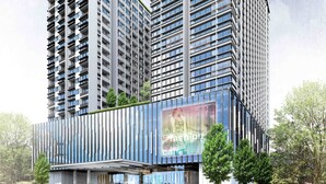 A modern high-rise building with multiple floors, large windows, and a prominent entrance area with a digital advertisement display. - Louis Kienne Hotel Pemuda (Semarang)