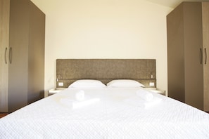 Apartamento, 2 quartos | 2 quartos, berços (sobretaxa), Wi-Fi de cortesia, roupa de cama