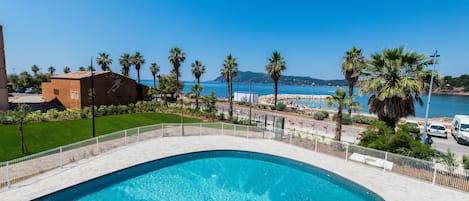 Indoor pool, seasonal outdoor pool, pool umbrellas, pool loungers