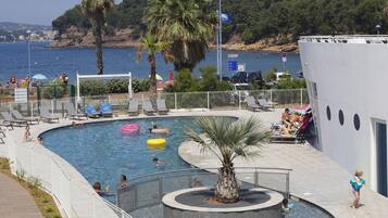 Indoor pool, seasonal outdoor pool, pool umbrellas, pool loungers