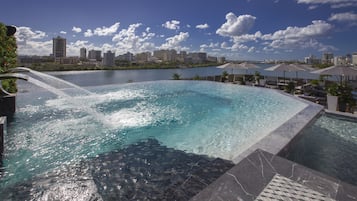 Outdoor pool, open 8:00 AM to 8:00 PM, cabanas (surcharge)