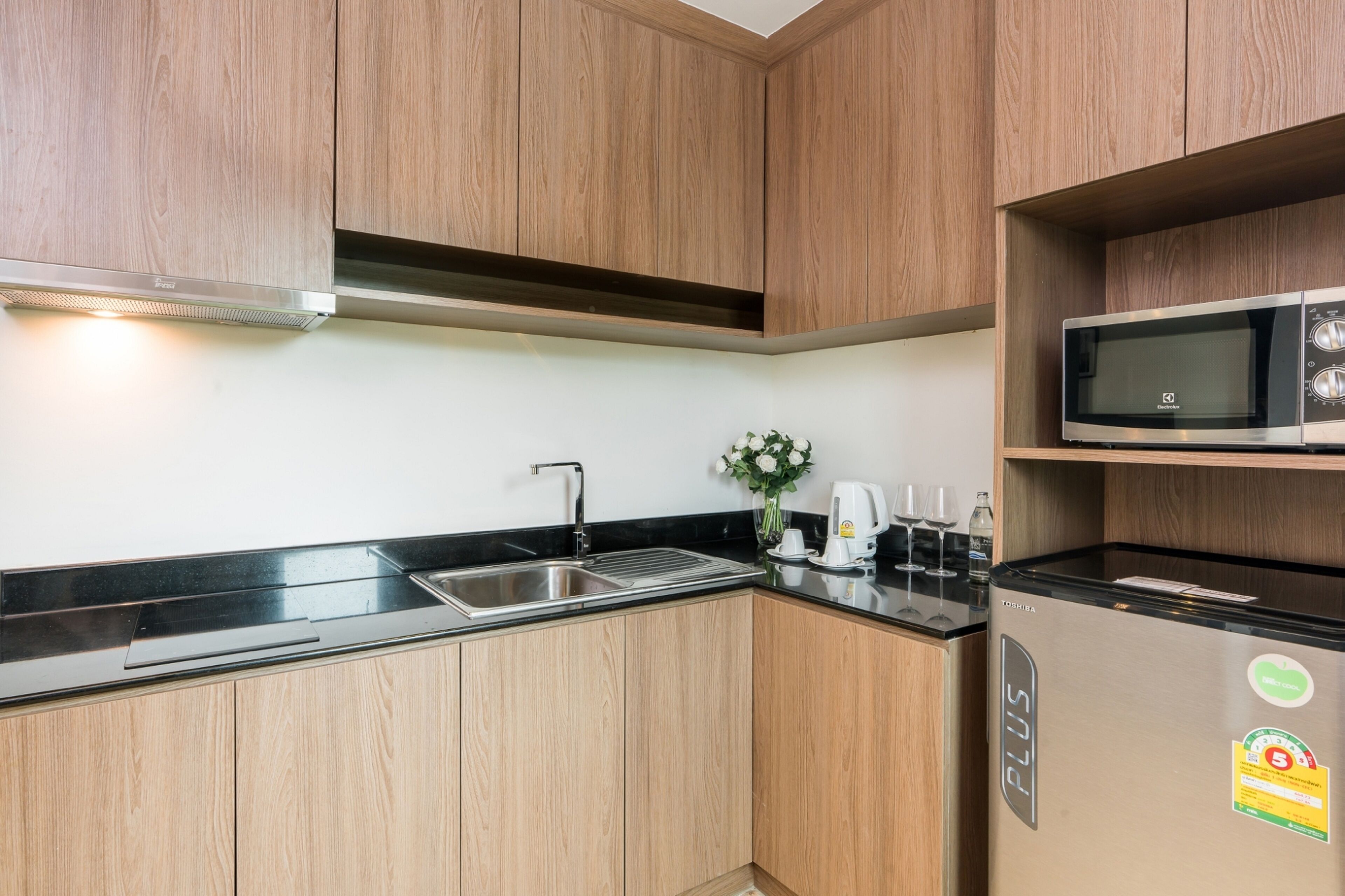 junior suite, 1 king bed, balcony | private kitchen | fridge, coffee/tea maker, electric kettle