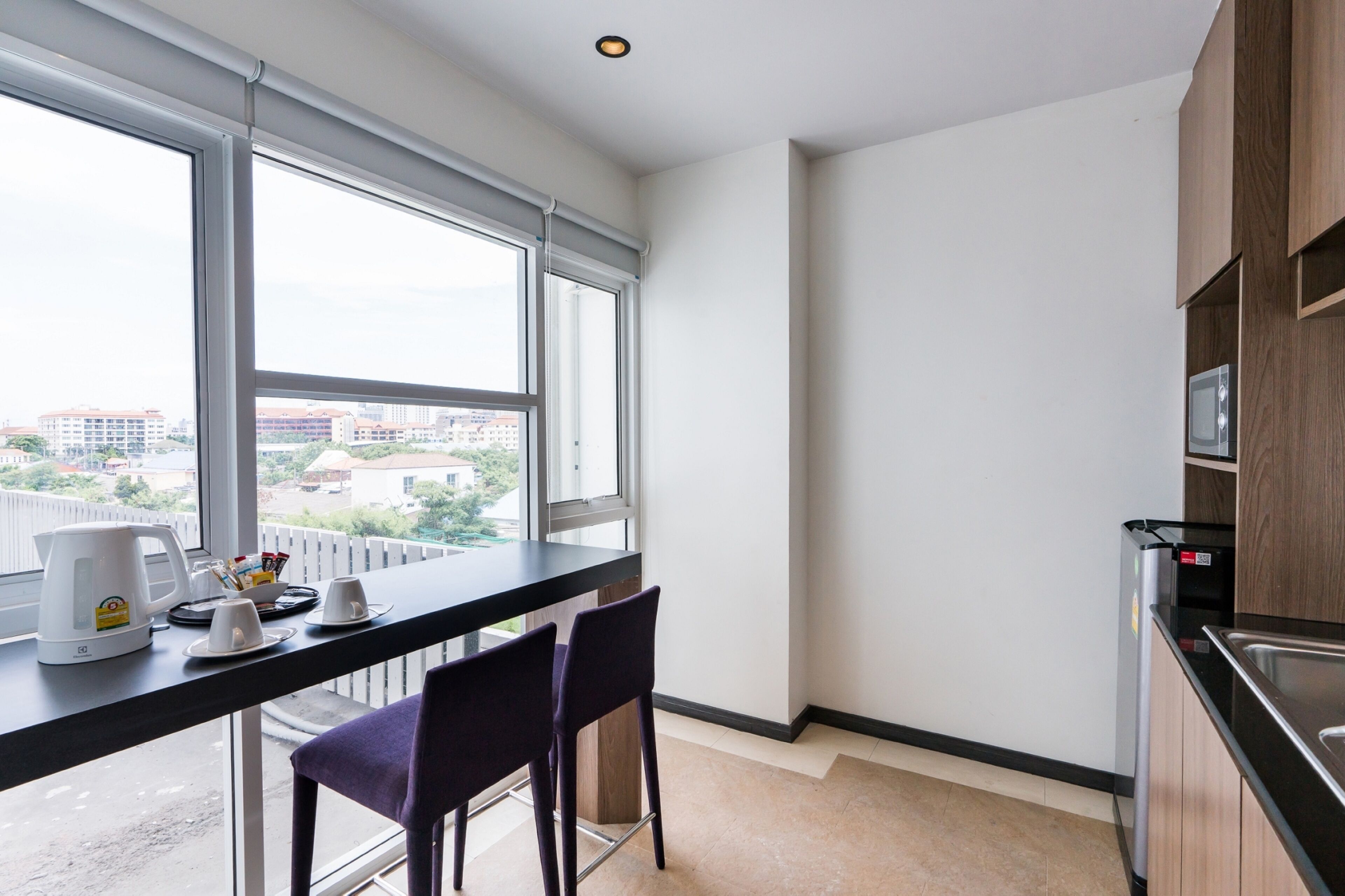 family suite, multiple beds, balcony | living area | flat-screen tv