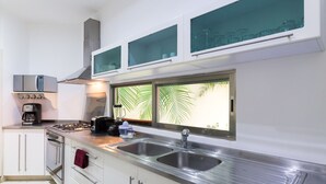 Deluxe Apartment, 3 Bedrooms, Poolside | Private kitchen | Coffee/tea maker, fridge, microwave, cookware/dishes/utensils - Capri By CocoBR (Playa del Carmen)