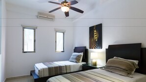 Deluxe Apartment, 3 Bedrooms, Poolside | 1 bedroom, in-room safe, iron/ironing board, cribs (free) - Capri By CocoBR (Playa del Carmen)