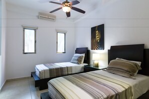 Deluxe Apartment, 3 Bedrooms, Poolside | 1 bedroom, in-room safe, iron/ironing board, free cribs/infant beds - Capri By CocoBR (Playa del Carmen)