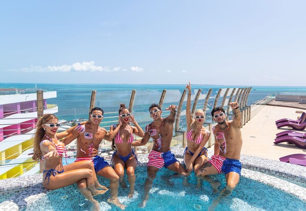 2 outdoor pools, pool umbrellas, pool loungers