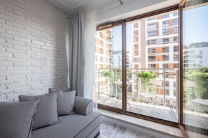 Departamento exclusivo | Sala de estar | Televisión de pantalla plana 